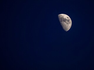 Half moon shadow with craters