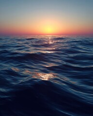 Obraz premium Endless tranquility unfolds as soft waves gently reflect the warm hues of dusk on a serene ocean horizon