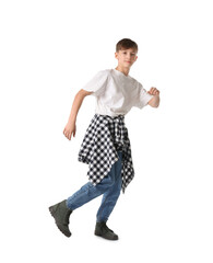 Naklejka premium Boy in stylish clothes dancing on white background