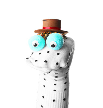 Funny sock puppet with hat isolated on white