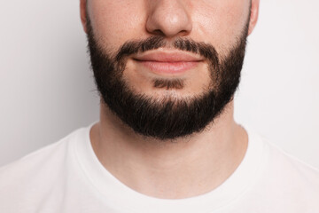 Obraz premium Man before shaving on light background, closeup