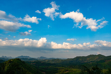Landscape nature view blue sky white clouds over mountains in good weather day