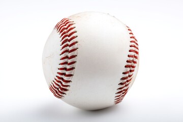 Baseball resting on a clean surface with detailed stitching visible under bright light