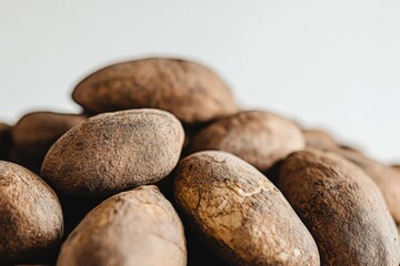 Obraz premium A close-up shot of sapucaia nuts (Brazil nuts) perfect for illustrating healthy eating, nutrition, and Brazilian cuisine isolated on white background