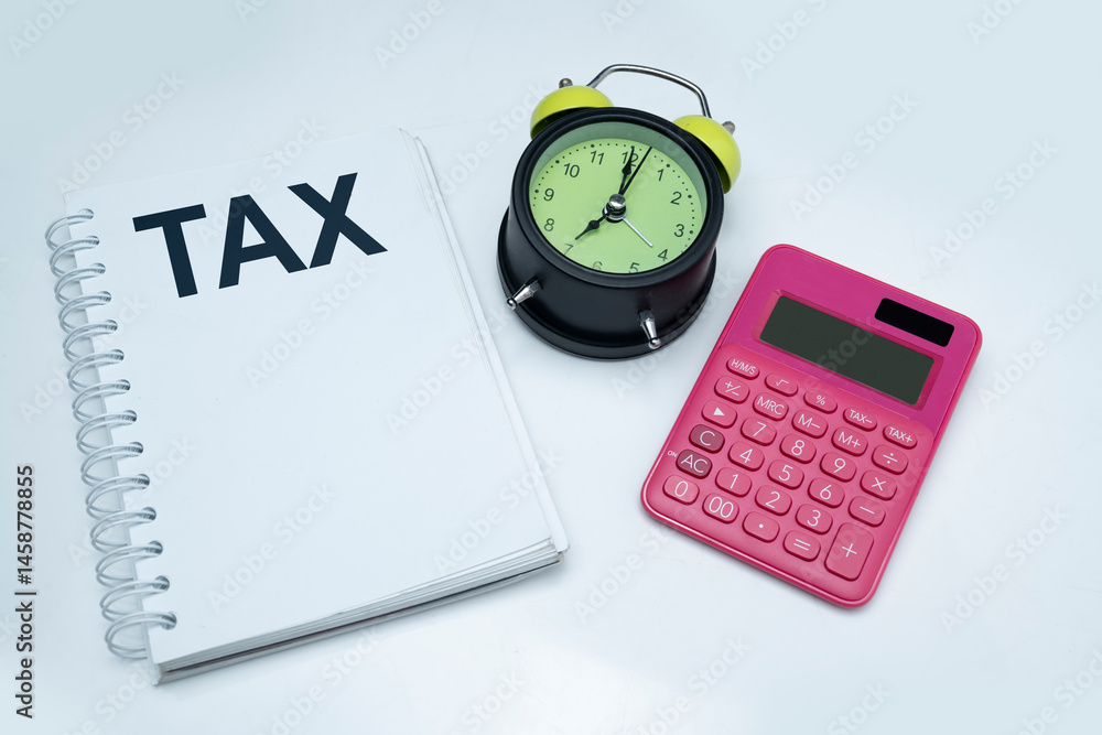 Aufkleber green alarm clock and calculator with notebook with text of tax on white background. copy space. con