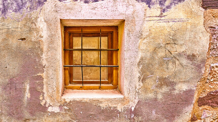 Closed Old Traditional Window on an Old Wall