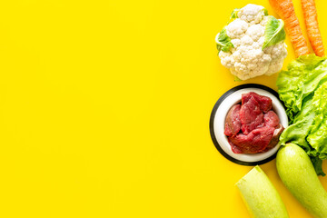Dry and natural pet food with ingredients. Meat with vegetables - zucchini, carrots and greens