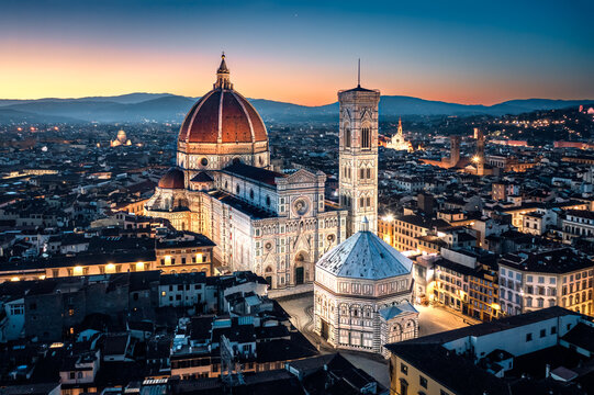 Aerial view of cathedral and bell tower at dusk, Florence, Tuscany, Italy