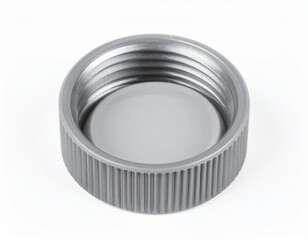 Metal cap interior, showing ridges and smooth, opaque center on white surface