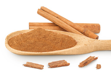 Cinnamon sticks with powder in wooden spoon isolated on white background with full depth of field