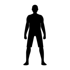 Silhouette of a man in shorts standing with his feet apart