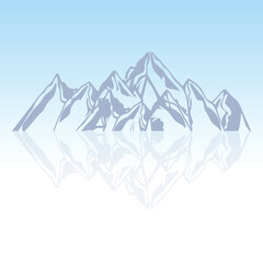 Grey mountains with the reflection on the water