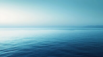 Fototapeta premium A soothing blue gradient background with a soft, ocean-inspired transition between hues.