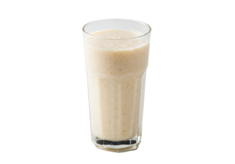 Creamy beige smoothie in a tall clear glass isolated on black