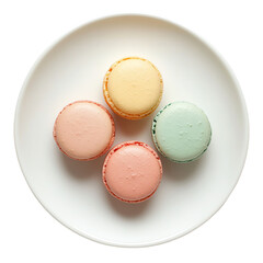 Fototapeta premium Colorful macarons arranged neatly on a white plate, top view.