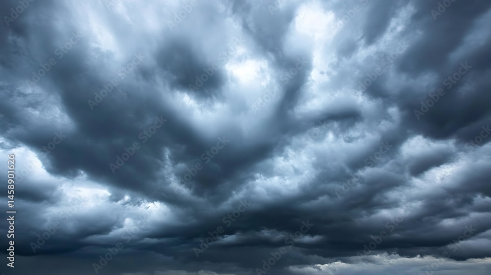 Aufkleber a dramatic, dark, and moody sky filled with heavy, grey cumulonimbus clouds, creating a powerful and