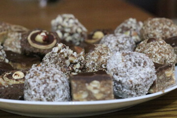 Delightful assortment of homemade confections on a plate at a cozy gathering