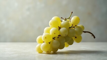 Timorasso. Fresh green grapes cluster with smooth skin resting on white surface, perfect for healthy food blogs, market promotions, recipes, summer themes, natural light, soft neutral background, bri
