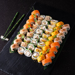 tasty sushi on the black background