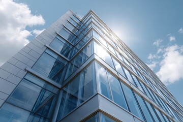 Obraz premium Modern Glass Building Against Sky