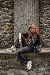 Teenage Girl in Denim Expressing Rebellion and Emotional Isolation