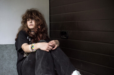 Teenage Girl in Denim Expressing Rebellion and Emotional Isolation