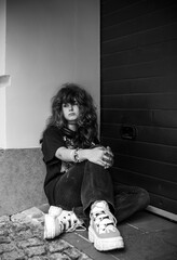 Teenage Girl in Denim Expressing Rebellion and Emotional Isolation