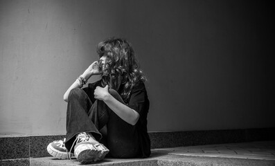 Teenage Girl in Denim Expressing Rebellion and Emotional Isolation