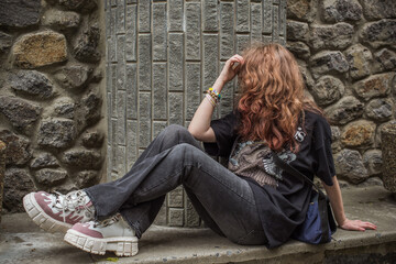 Teenage Girl in Denim Expressing Rebellion and Emotional Isolation