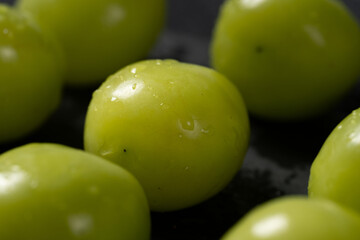 Close-up of grapes on table