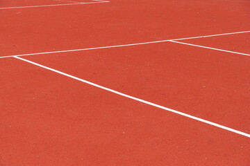 Geometric Pattern: Red Surface with White Lines Forming Court Layout for Sporting Events, Recreation & Exercise