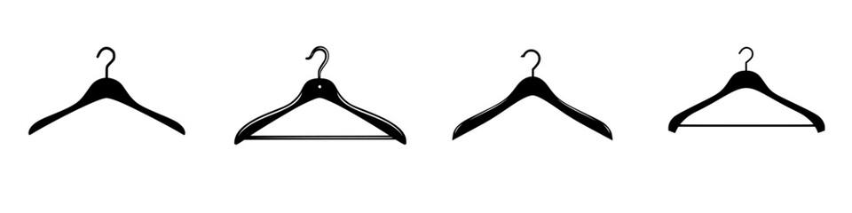 Collection of flat black coat hangers displayed in a row showing various designs and styles for organizing clothing items