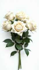 Naklejka premium Bouquet of white roses with green leaves on a black background