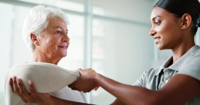 Elderly woman, stretching arms and physiotherapist for checkup, injury progress and medical advice. Senior patient, helping and physiotherapy of mobility assessment, rehabilitation and muscle healing