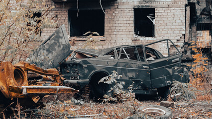 ruined street and destroyed houses in Ukraine
