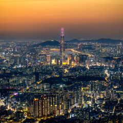 Dazzling Nightscape of Seoul City with Iconic Lotte World Tower Illuminated
