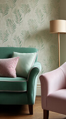 Green sofa with pink and mint pillows against a wall with green leaf wallpaper, showcasing a calm and relaxing interior design concept