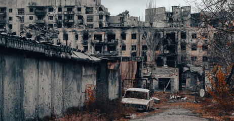 ruined street and destroyed houses in Ukraine