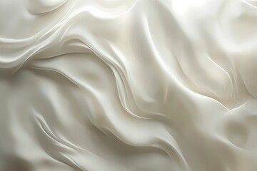 Obraz premium Close-up view of flowing, luxurious fabric draped in soft cream tones.
