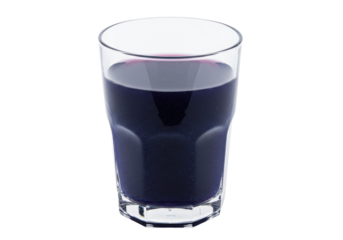A tall glass filled with a dark purple liquid reflecting light on its surface