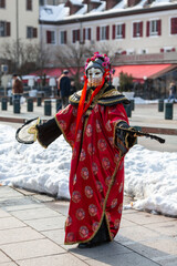 Disguised Person with Chinese Fans - Annecy Venetian Carnival 2013