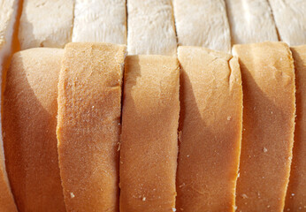 Fresh brown bread Top view, texture of fragrant bread background with brown bread edges macro food