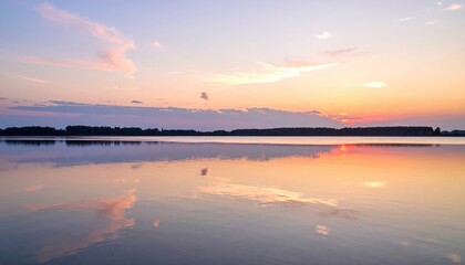 Serene Sunset over Calm Lake Water Reflecting Peaceful Sky Colors