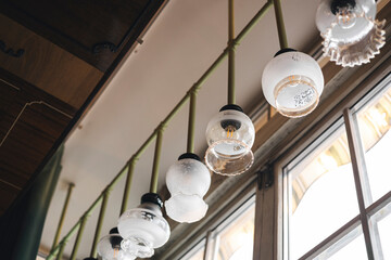 Old glass chandeliers in vintage retro style in the interior.