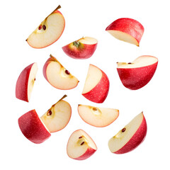 Red apple slices falling on black background fresh fruit healthy eating