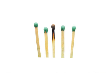 Set with one burnt matches on white background.