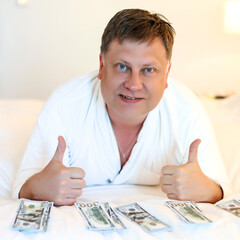 The man summed up the family budget, joy from high income.