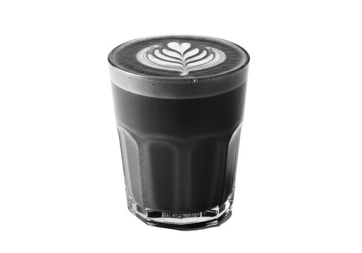Charcoal Latte Art A sleek black coffee creation with delicate heart design
