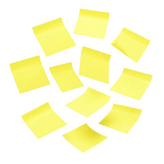 Yellow sticky tabs for page marking floating in mid-air on a solid white background