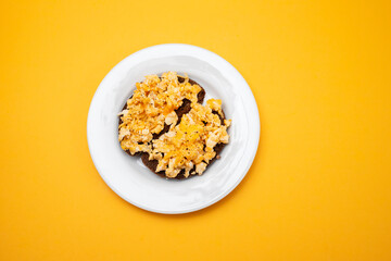 scramble eggs with black bread on dish